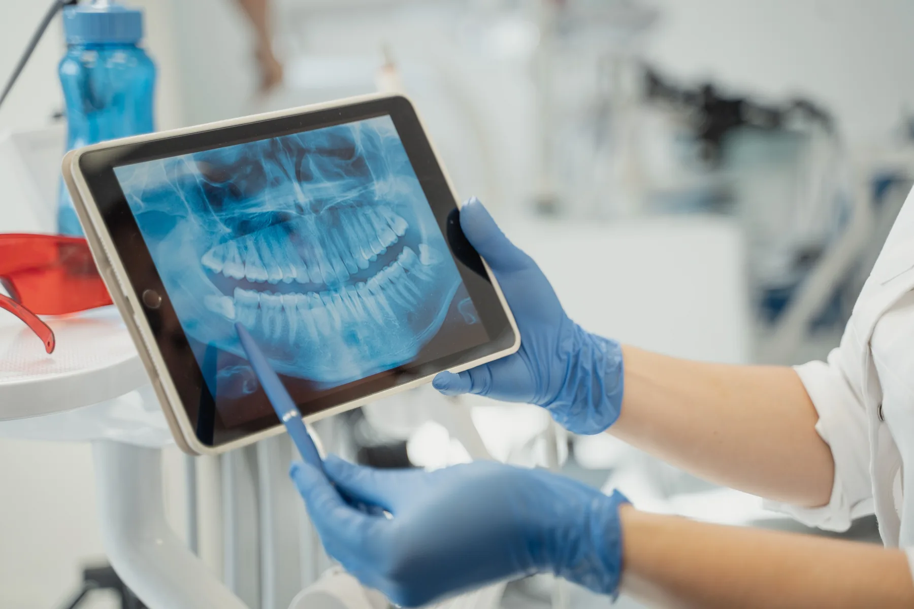 Dentist reviewing a digital scan on a tablet